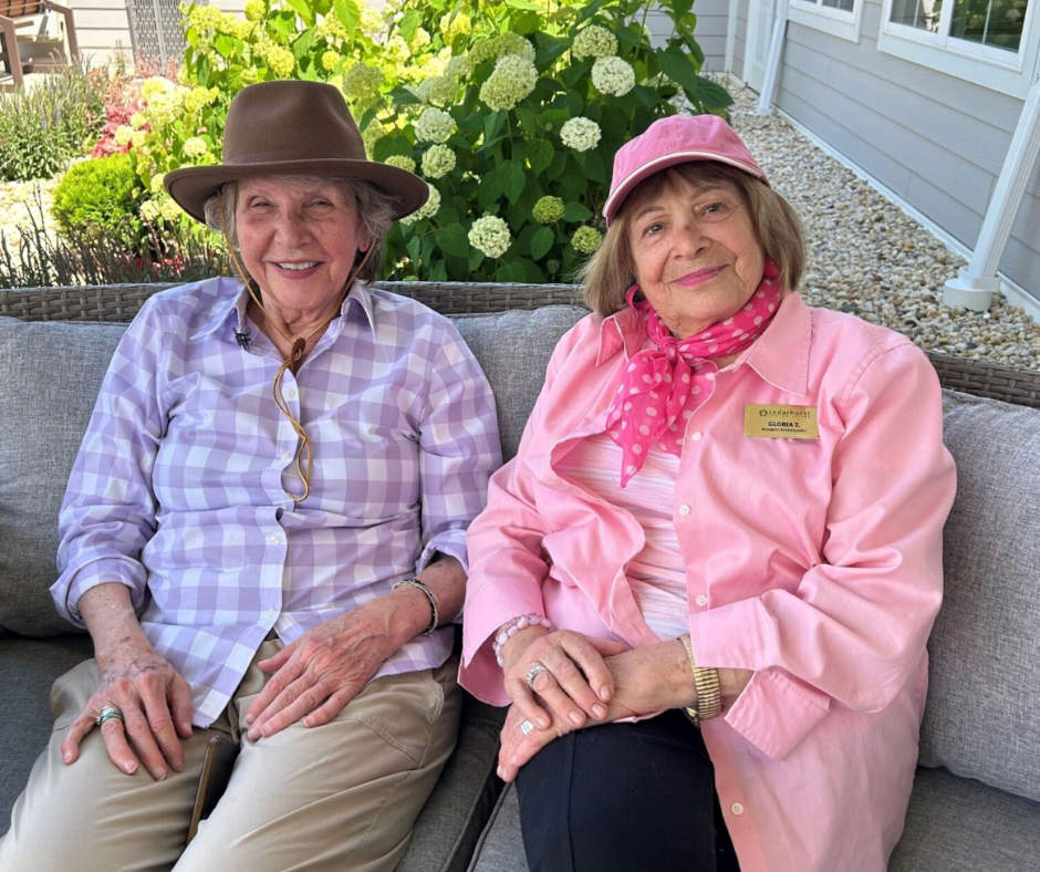 Cedarhurst resident ambassador and friend sitting outdoors