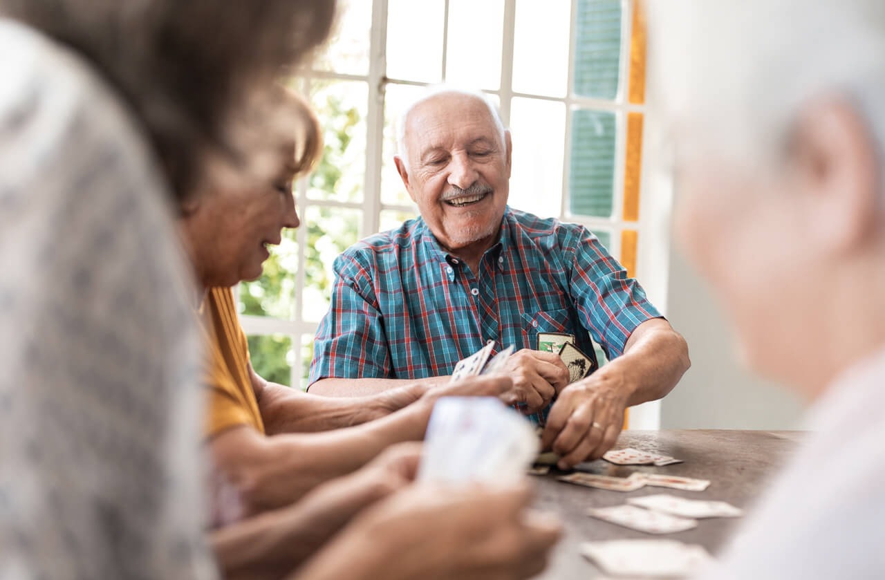 seniors playing cards