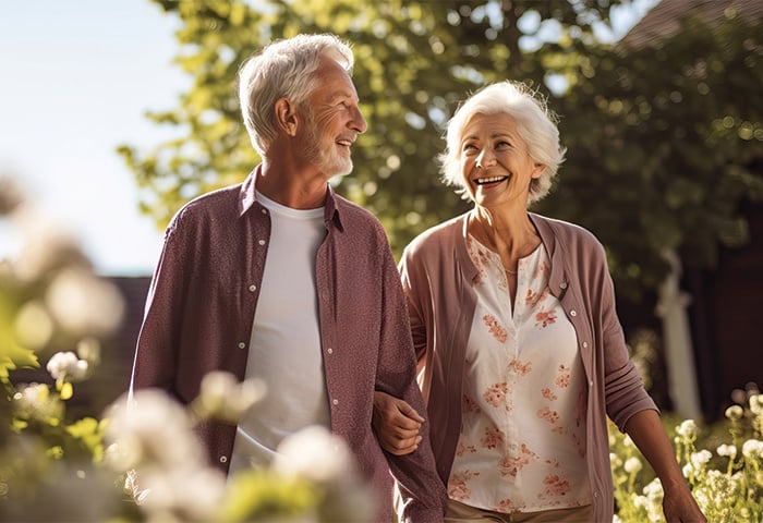Senior living residents walking outdoors