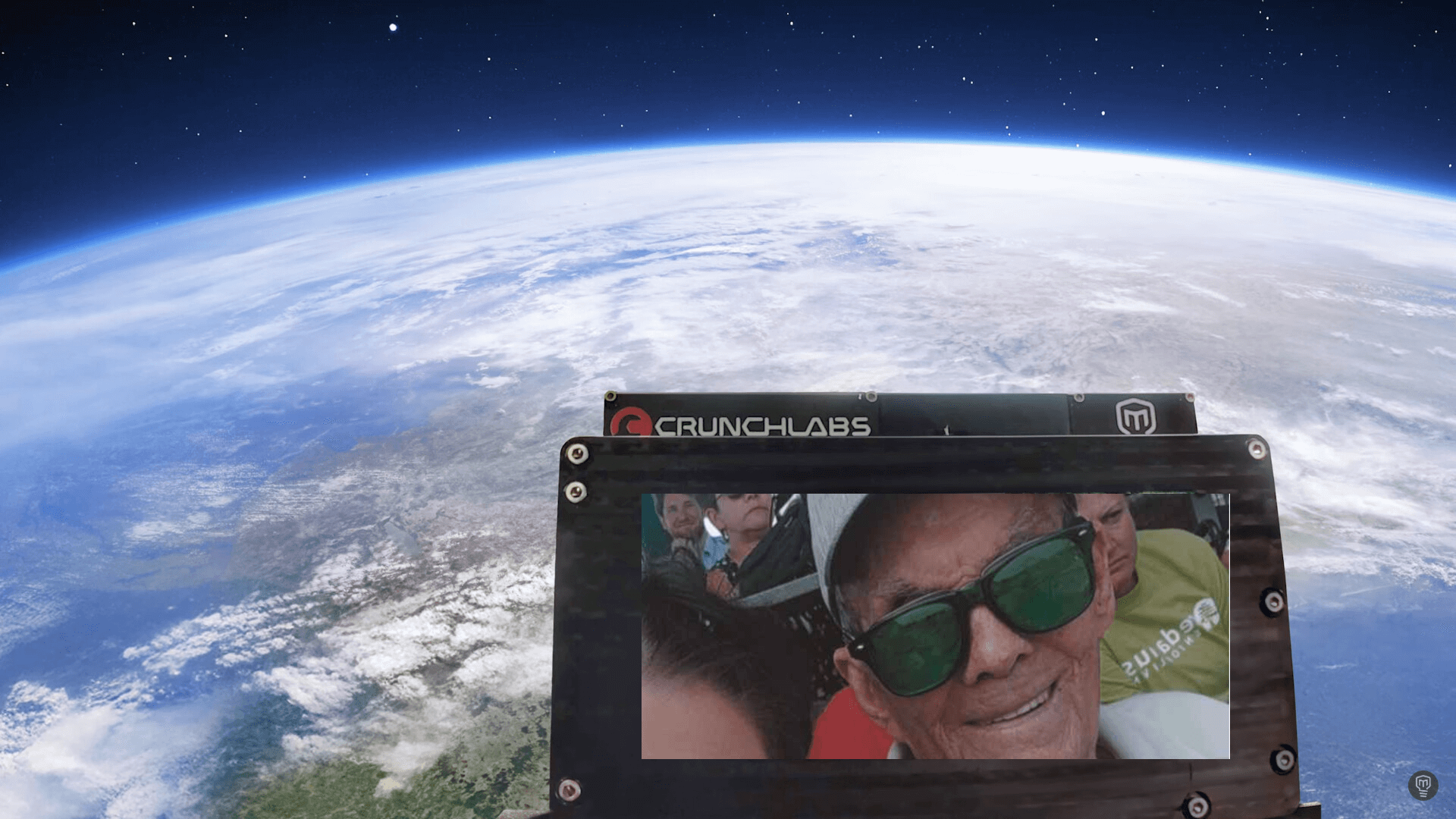 A photo of Cedarhurst resident Sid Trexler is displayed on the screen of a CrunchLabs satellite orbiting Earth.