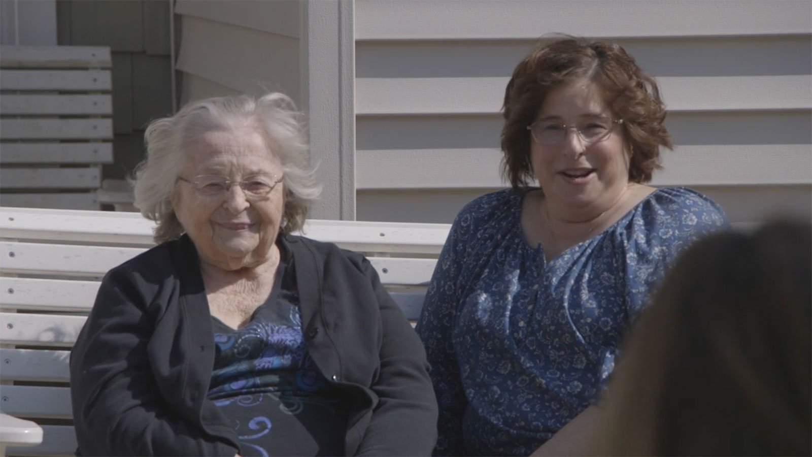 A senior mom with her adult child