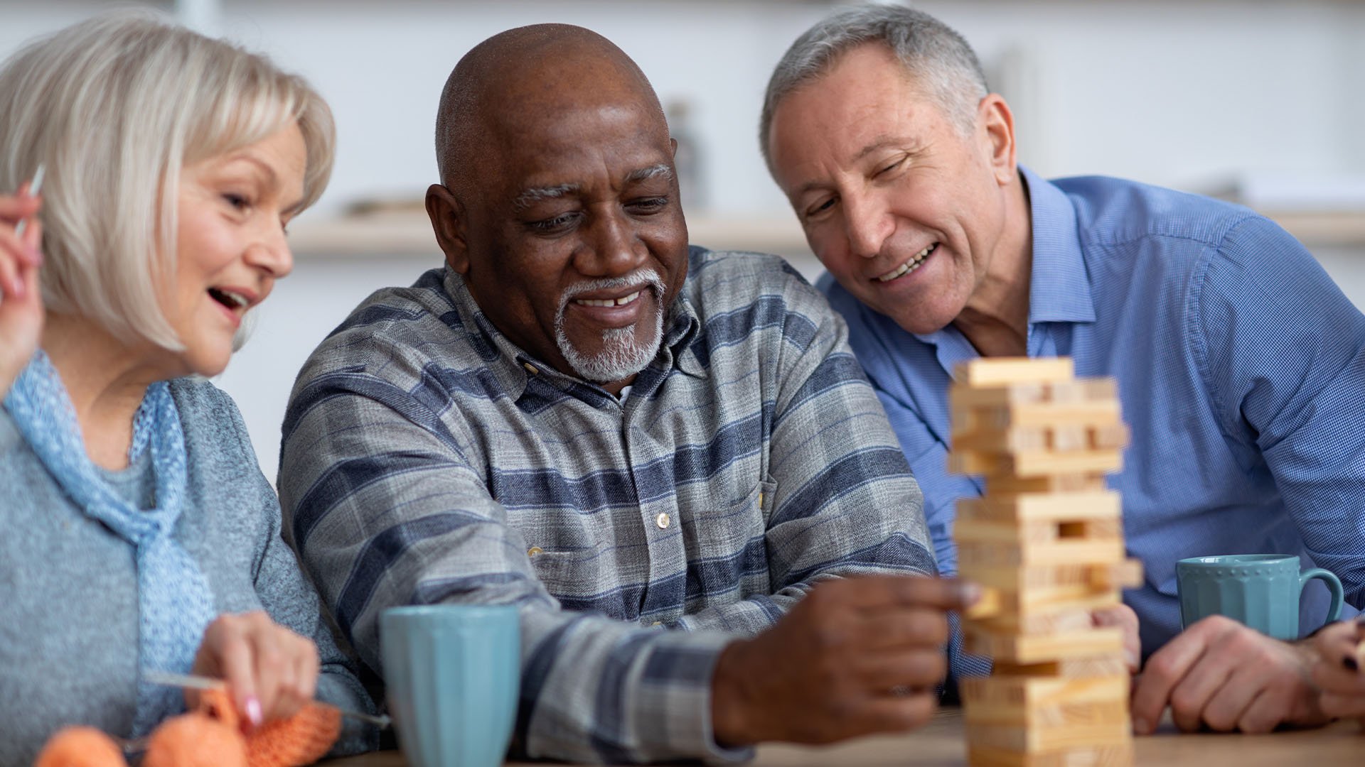 Senior living residents playing Jenga