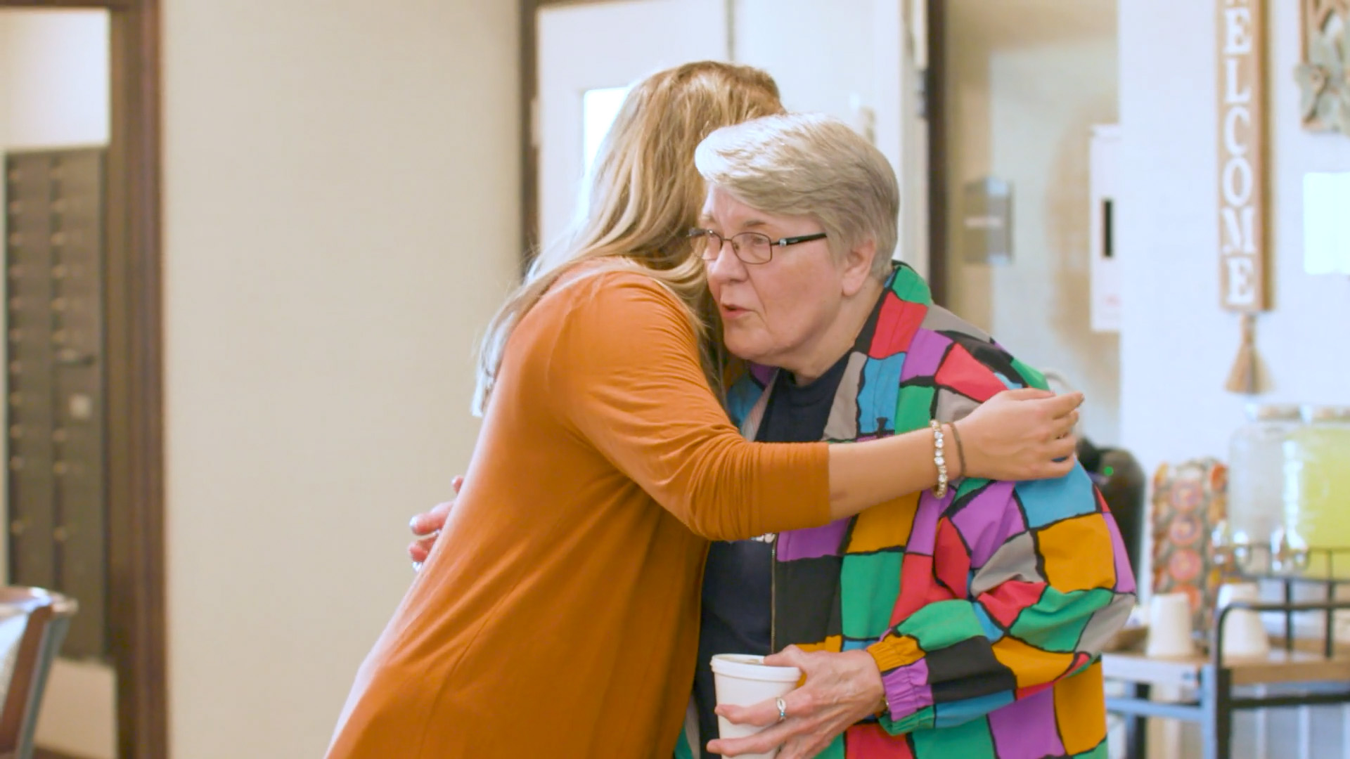 Senior living resident Hug - video