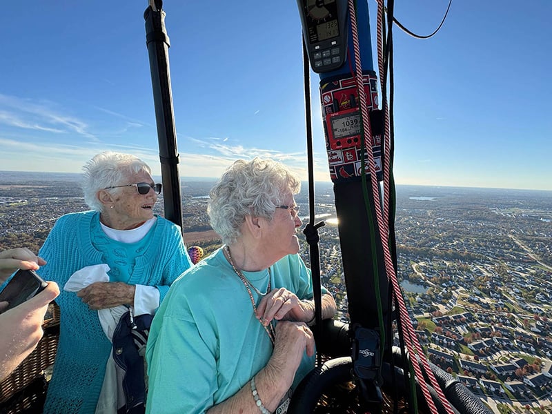 Two senior women in a hot air balloon Two senior women in a hot air balloon
