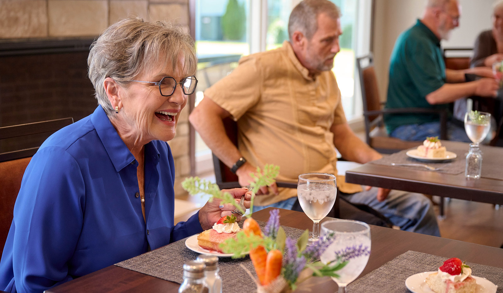 senior woman having lunch at restaurant