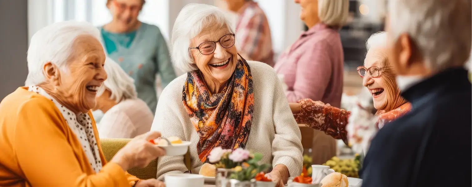 Senior living residents enjoying a meal