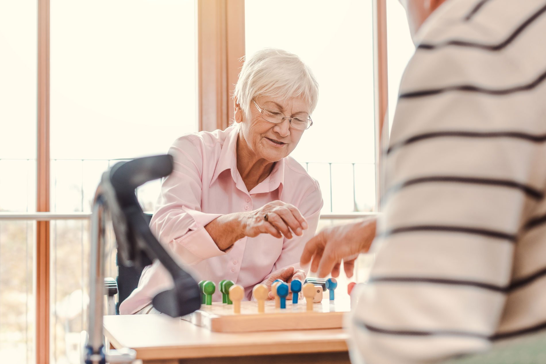 seniors playing a board game