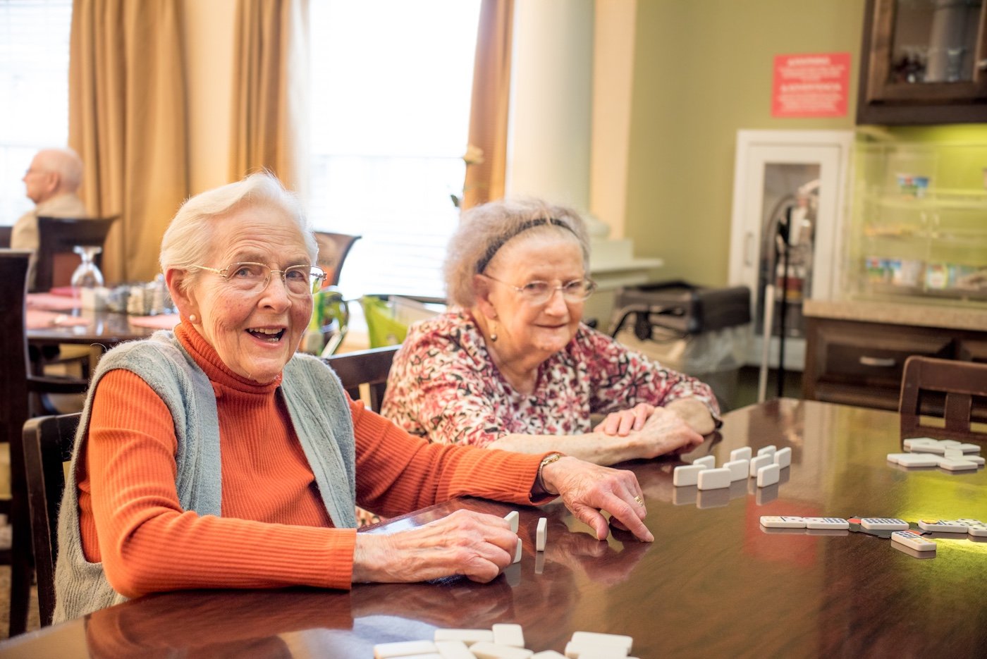 Senior women playing dominos Senior women playing dominos