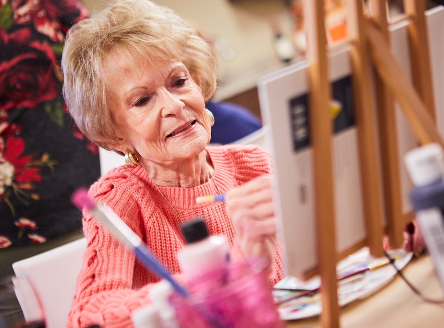 Senior woman painting
