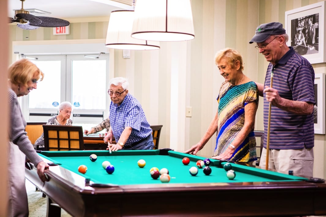 Group of Seniors Playing Pool