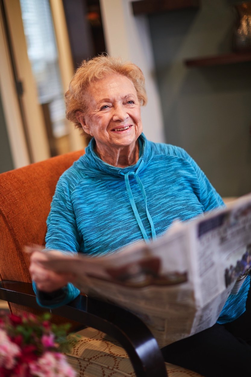 Happy Senior reading news Happy Senior reading news