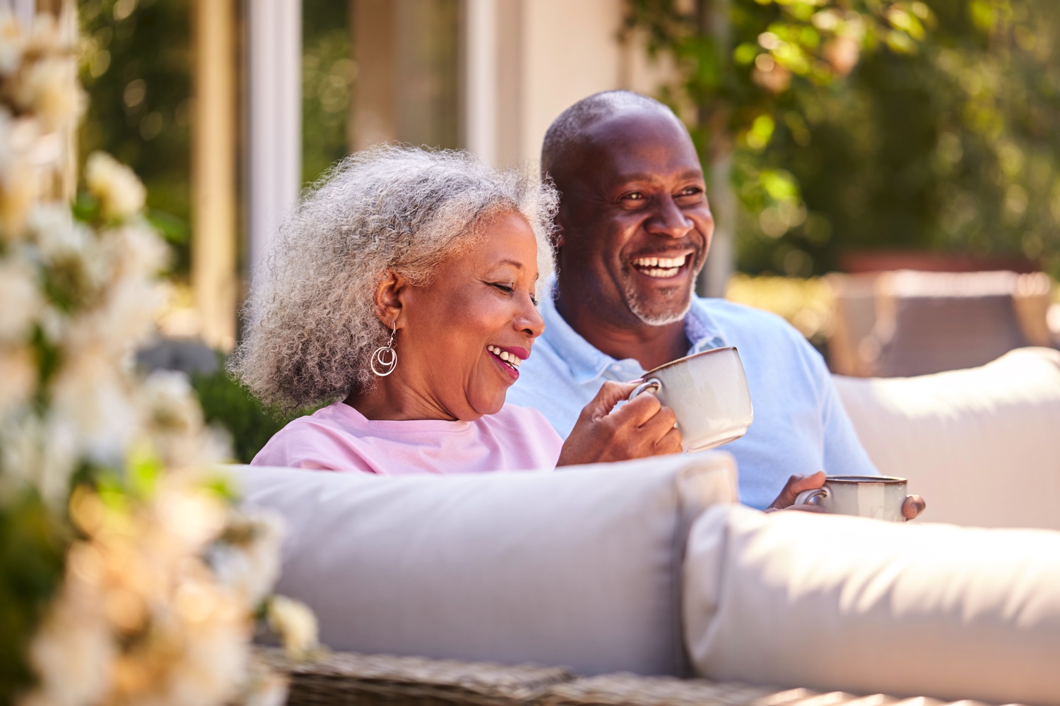 Retired Couple Sitting Outdoors