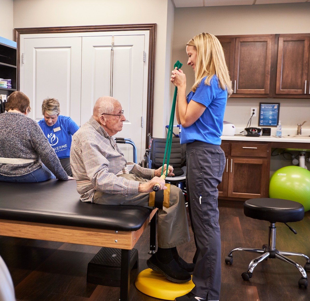 Senior man exercising with staff