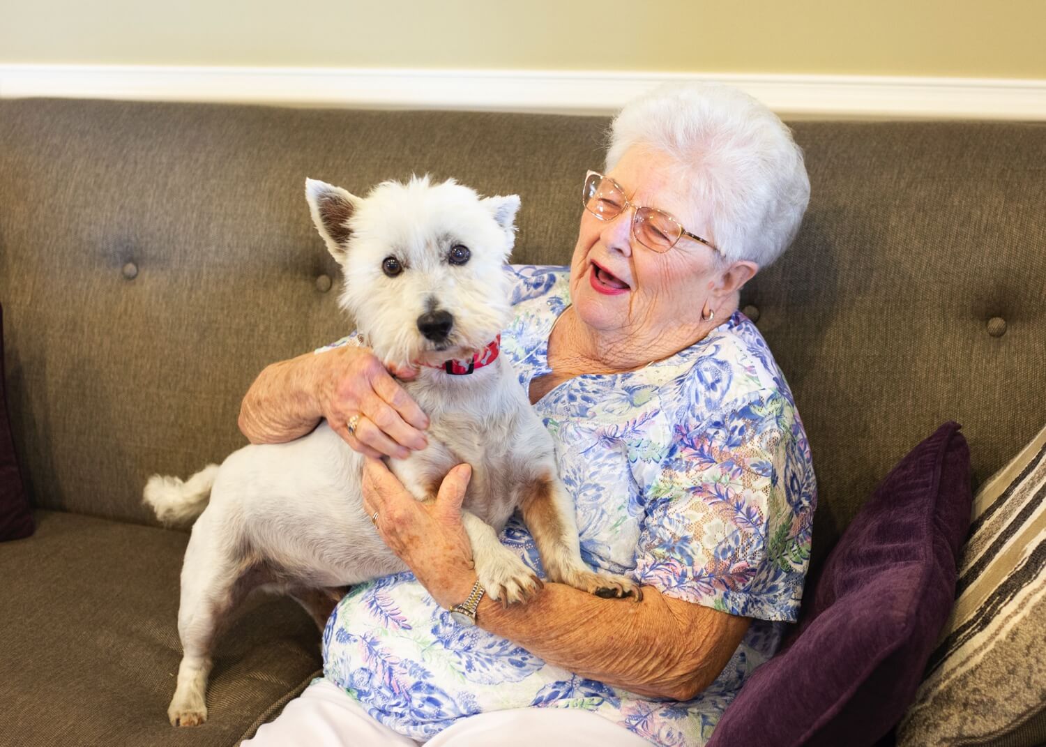 Resident Holding Dog