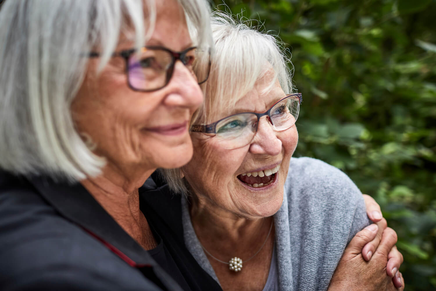 Two senior ladies smiling
