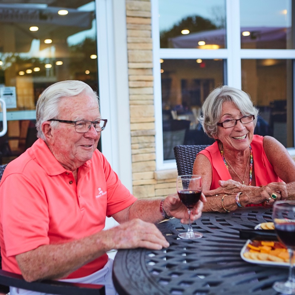 Residents enjoying wine outside