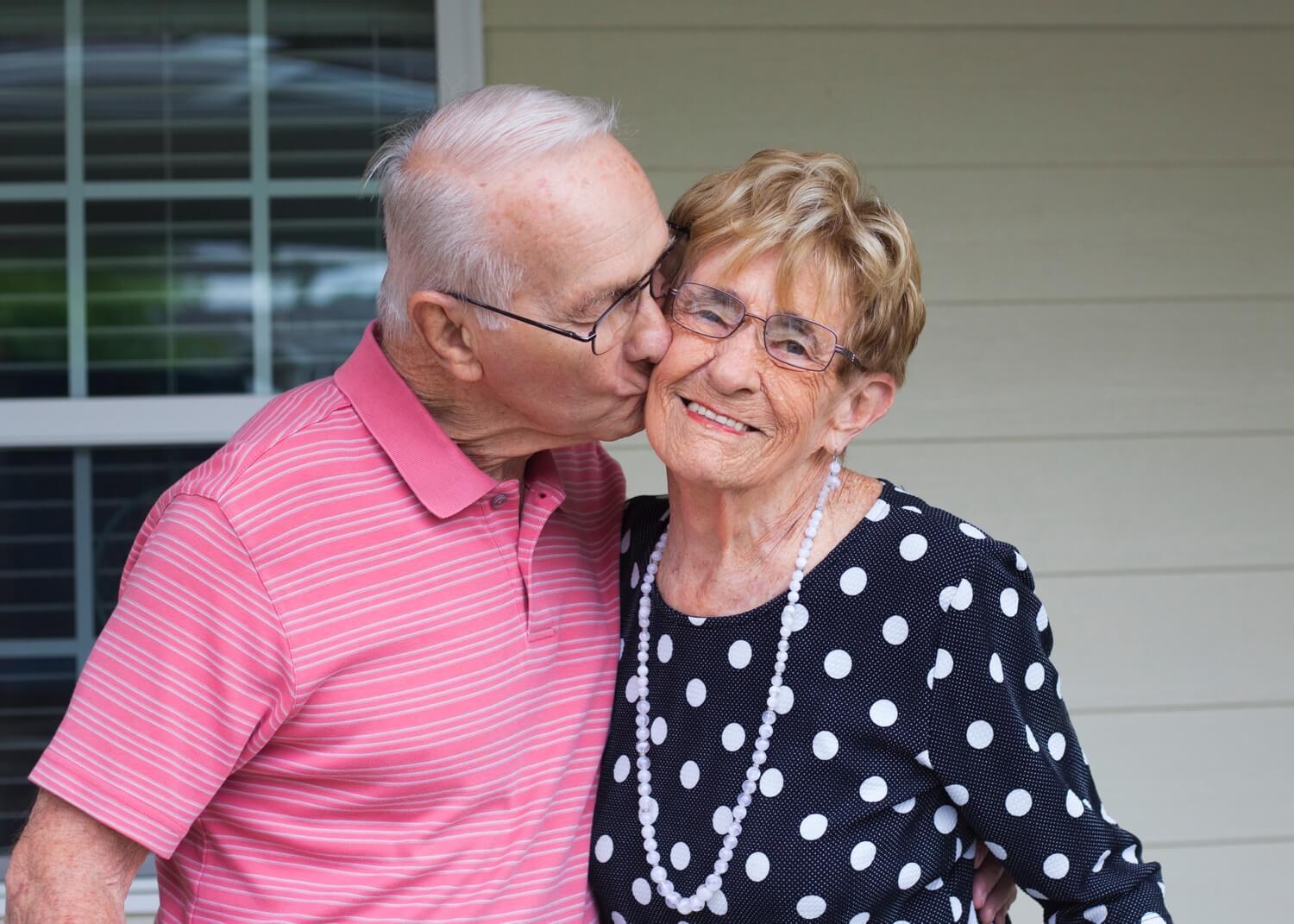 Couple Kissing and Smiling