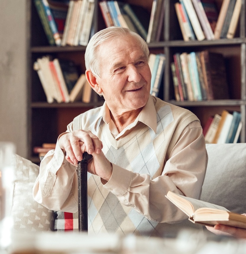 Senior man in library