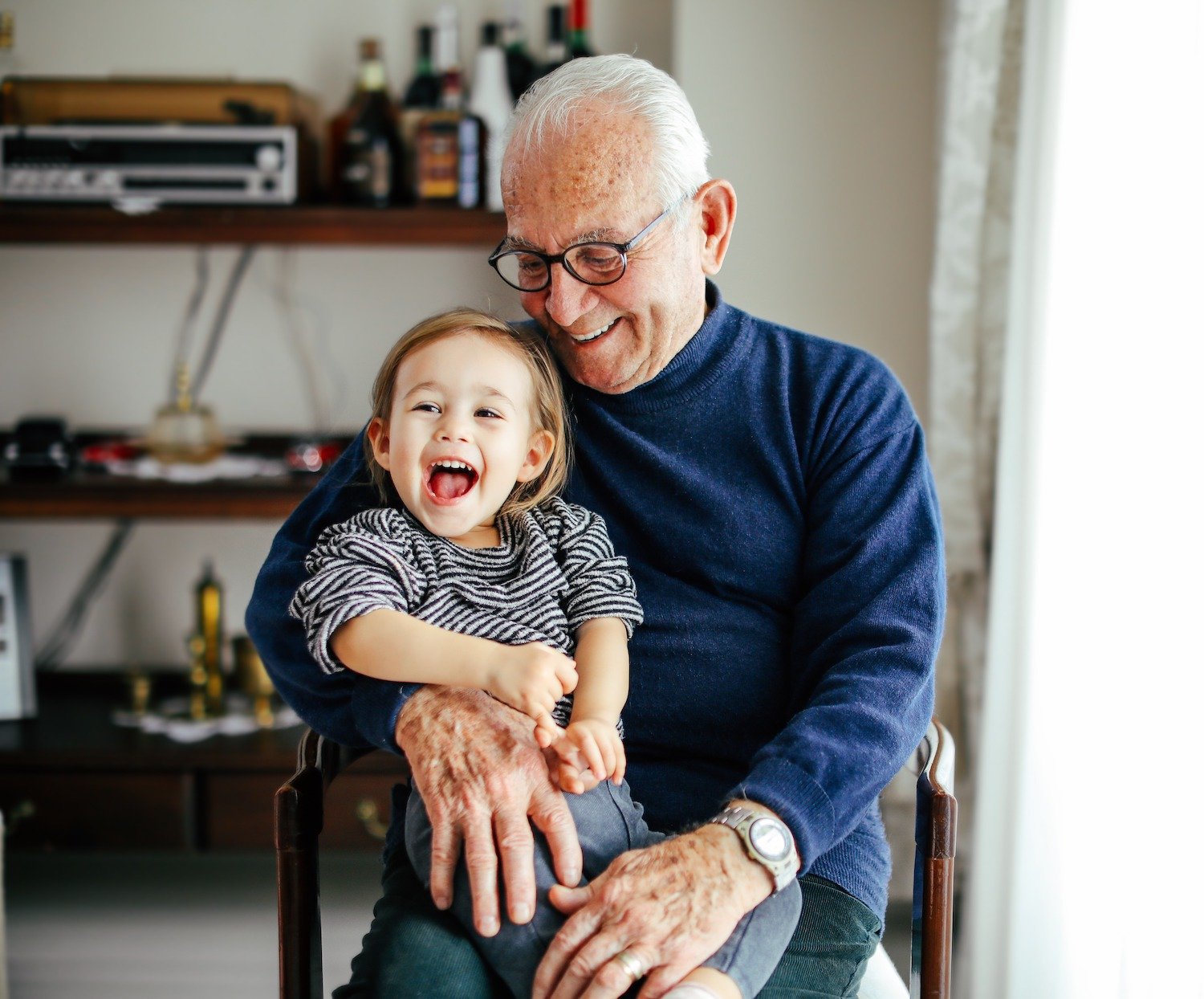 Grandfather holding his grandson