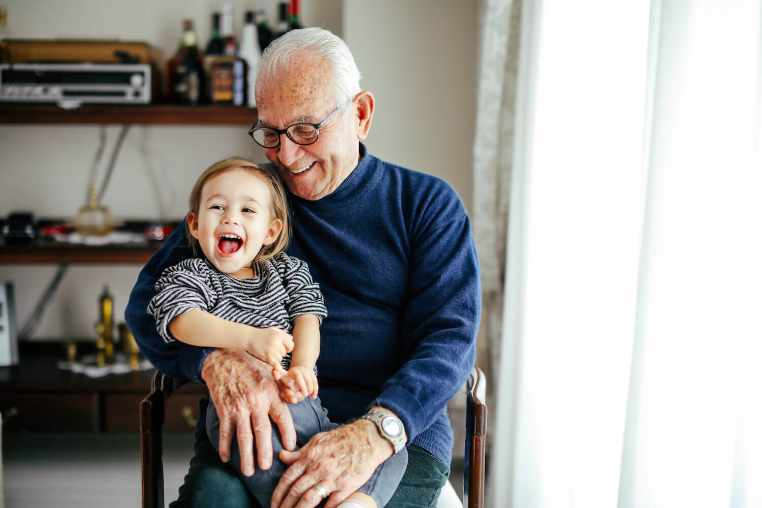 Grandfather Holding Grandson