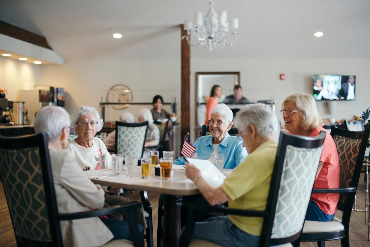 Residents dining together in a dining room