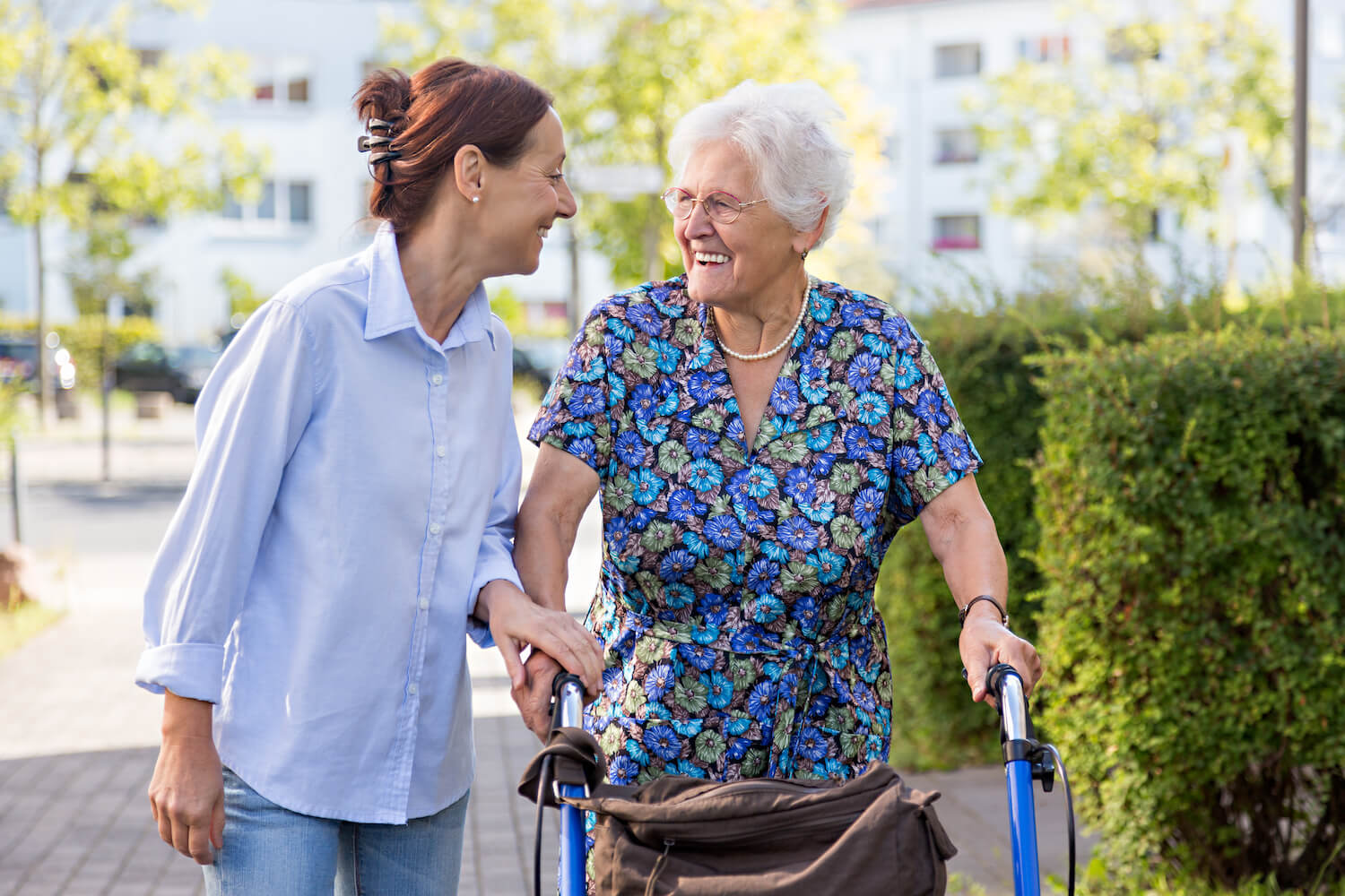 Caregiver walking with a resident