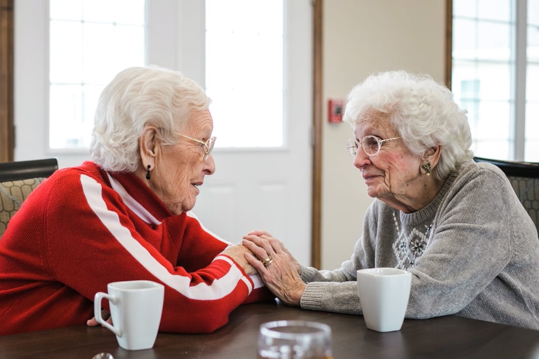 Senior women drinking coffee together