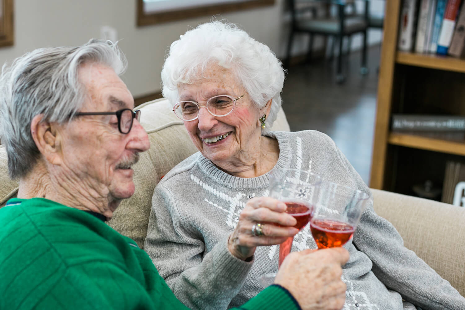 smiling senior woman drinking wine