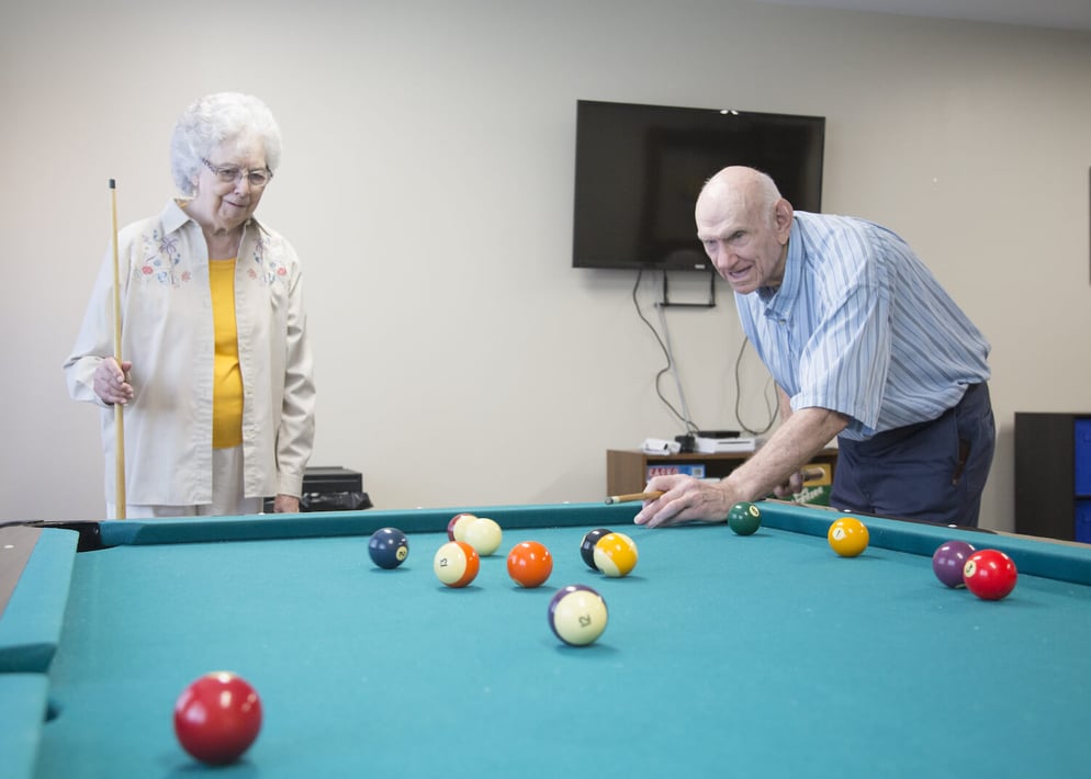 Seniors playing pool