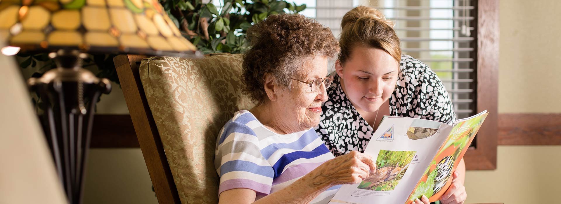 Woman Reading With Staff