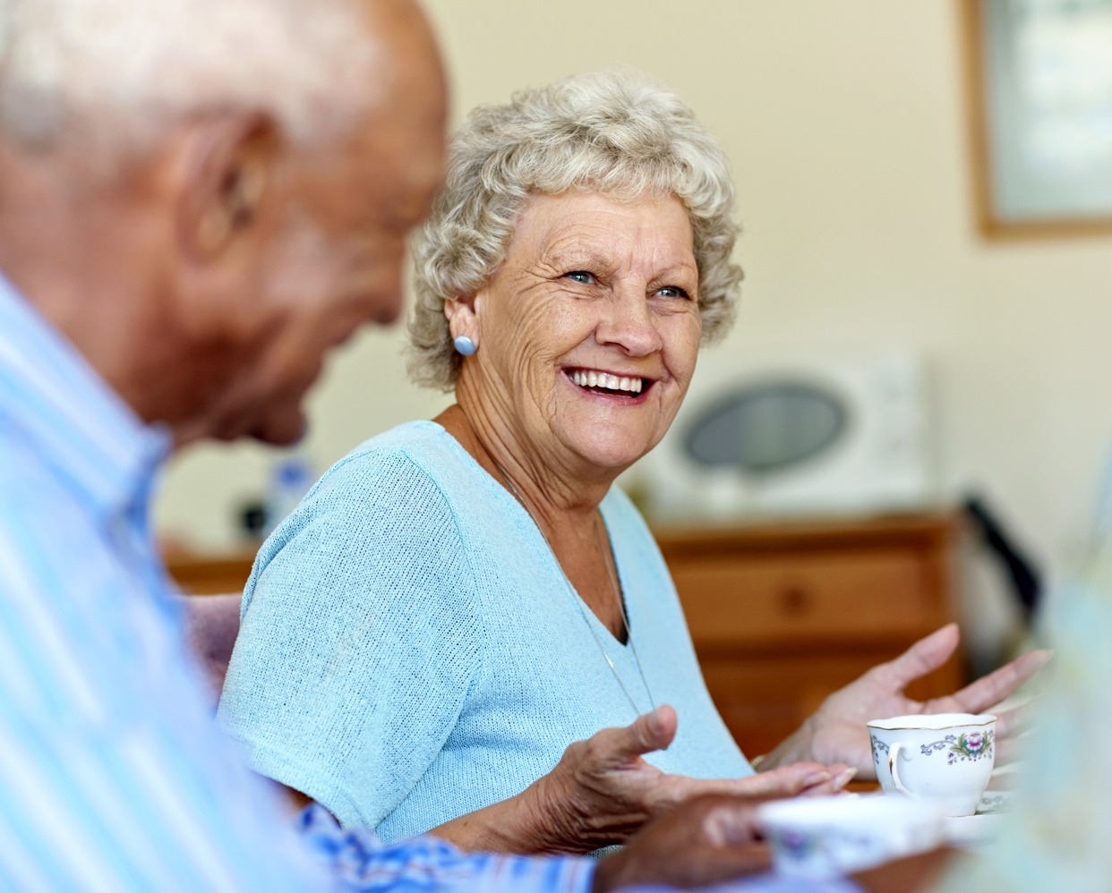 Senior friends having tea