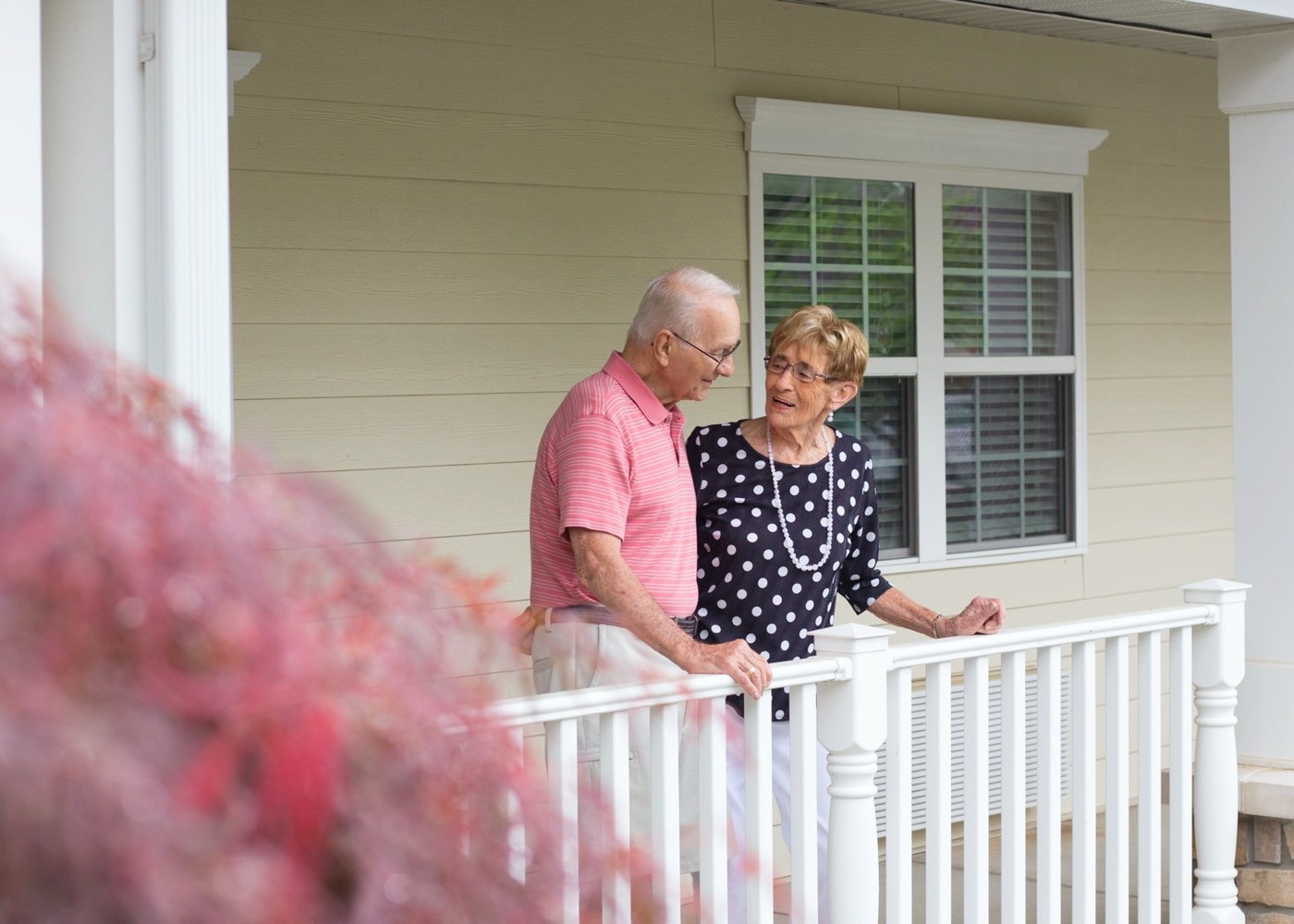 Senior couple standing outside