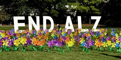 A sign with white lettering that reads 'END ALZ'