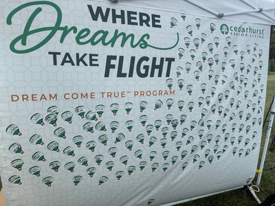 A tent wall covered in hot air balloon stickers