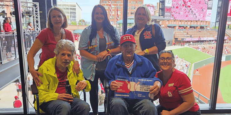 A Cedarhurst resident, along with friends and family, poses for a photo at Busch Stadium, where he's watching the St. Louis Cardinals play.