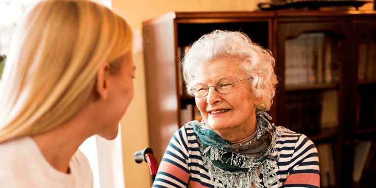 Smiling senior woman with her daughter