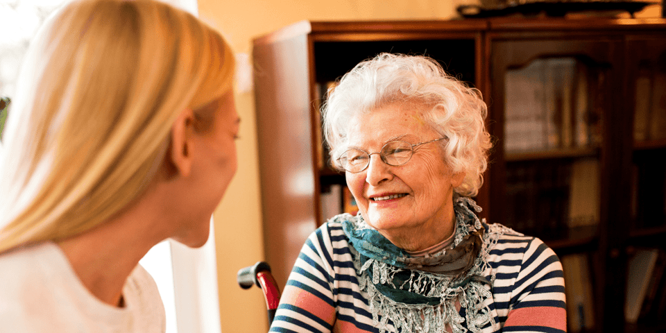 Smiling senior woman with her daughter