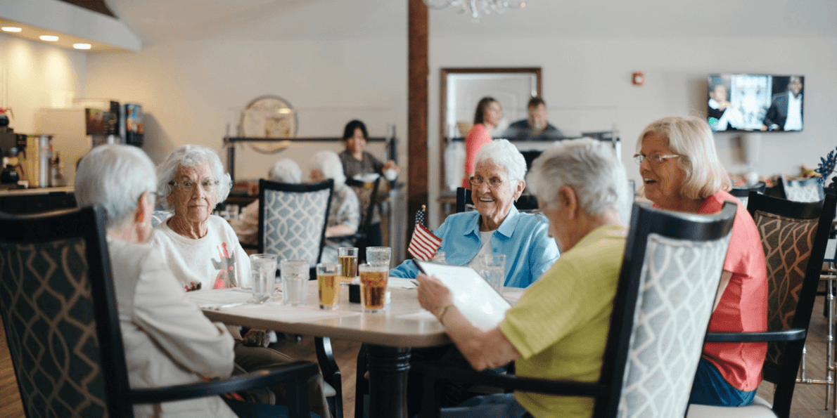 seniors dining in a community restaurant-style dining area