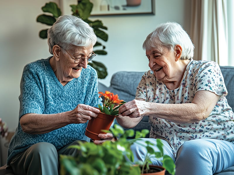 Independent living residents clapping and smiling