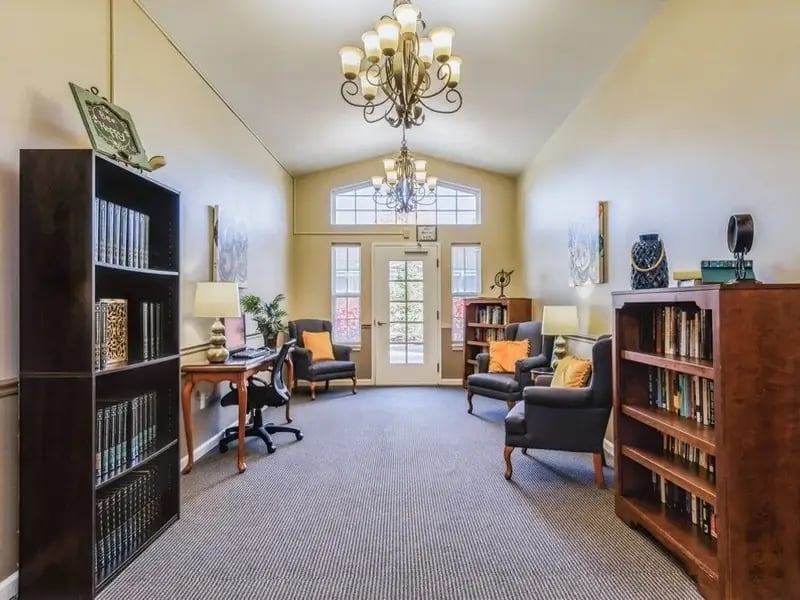 A beautifully designed common area at Cedar Creek of Fort Wayne, offering a welcoming space for residents to connect, featuring comfortable seating