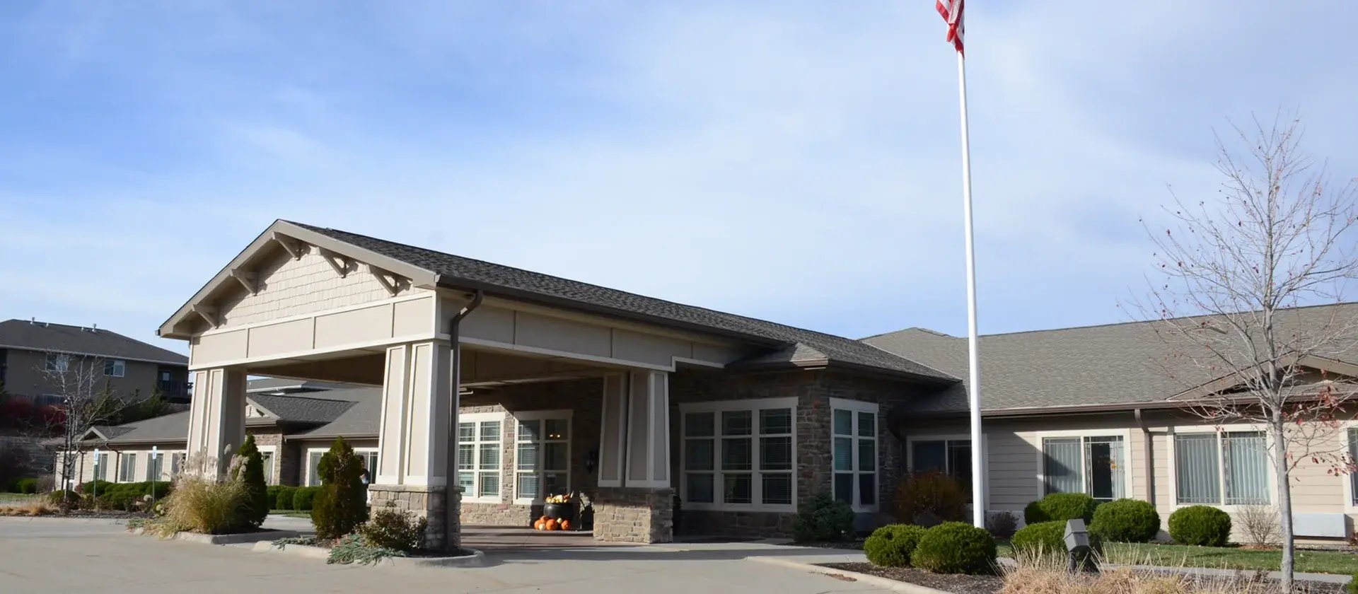 The welcoming front exterior of Cedar Creek of High Plains senior living community