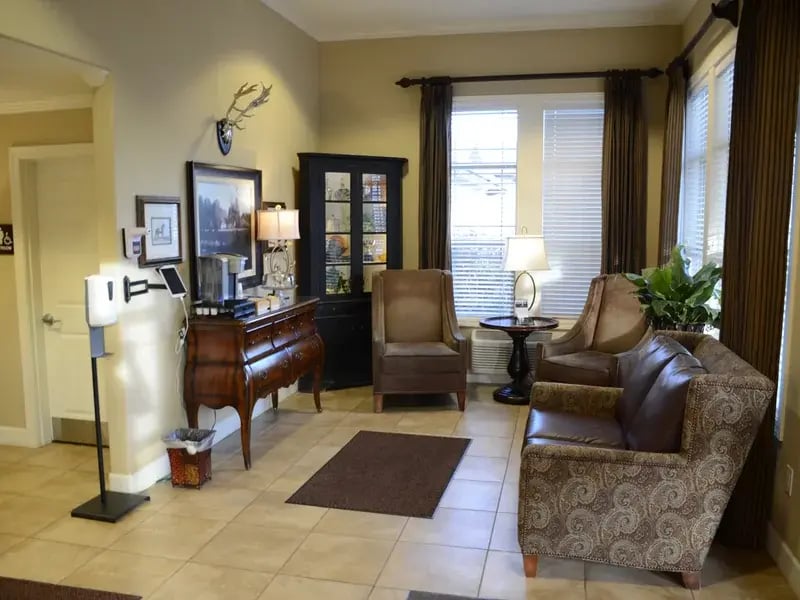 A beautifully designed common area at Cedar Creek of High Plains, offering a welcoming space for residents to connect, featuring comfortable seating