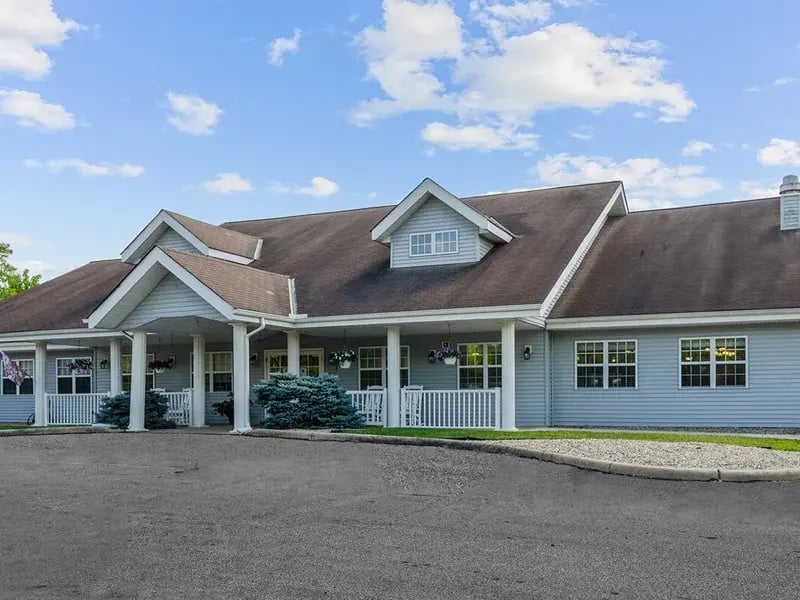 The welcoming front exterior of Cedar Creek of Logansport senior living community