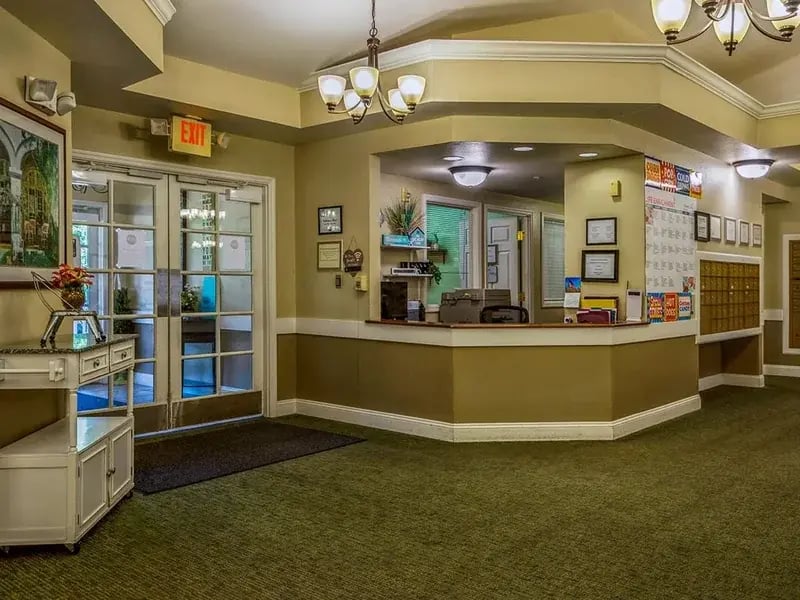 Cedar Creek of Logansport 's cozy common area, complete with a warm fireplace and comfortable seating