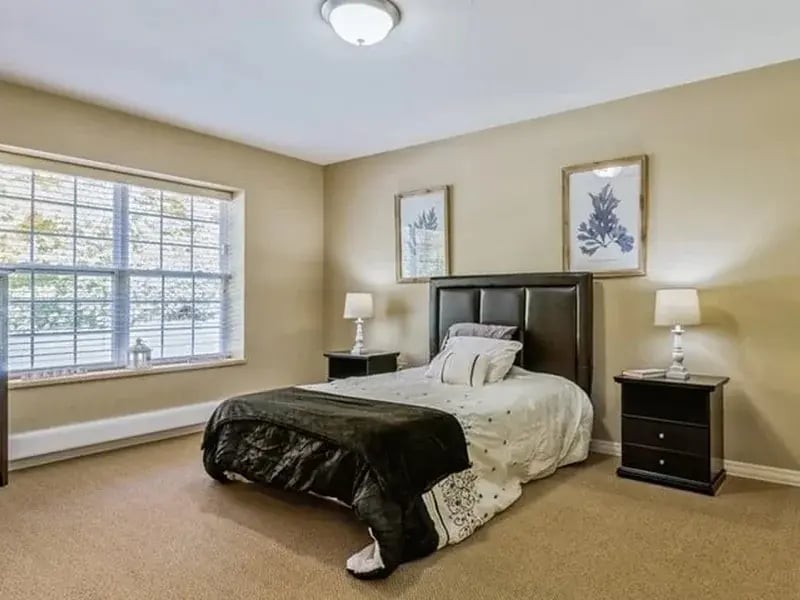 Bedroom of a senior apartment at Cedar Creek of Marion, designed for comfort and personalization