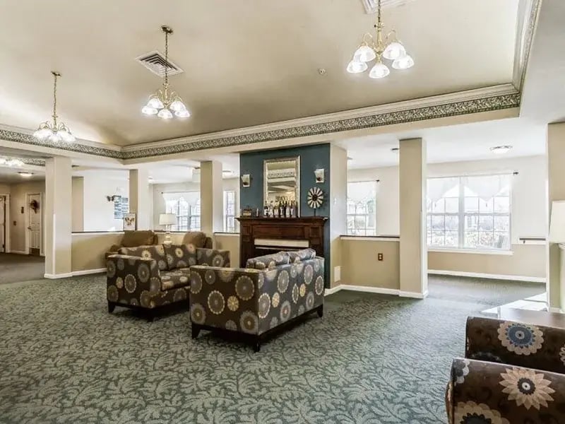 Cedar Creek of Marion's cozy common area, complete with a warm fireplace and comfortable seating