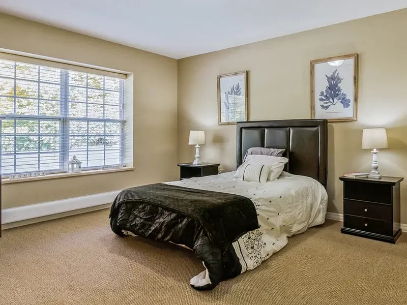 Bedroom of a senior apartment at Cedar Creek of Muncie, designed for comfort and personalization
