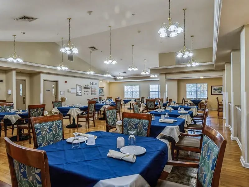 A spacious and bright dining room at Cedar Creek of Muncie, offering comfortable seating for meals