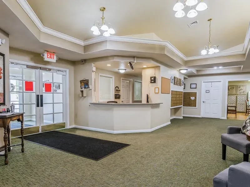 The bright and accessible main lobby at Cedar Creek of Muncie, offering a warm first impression to the senior living community