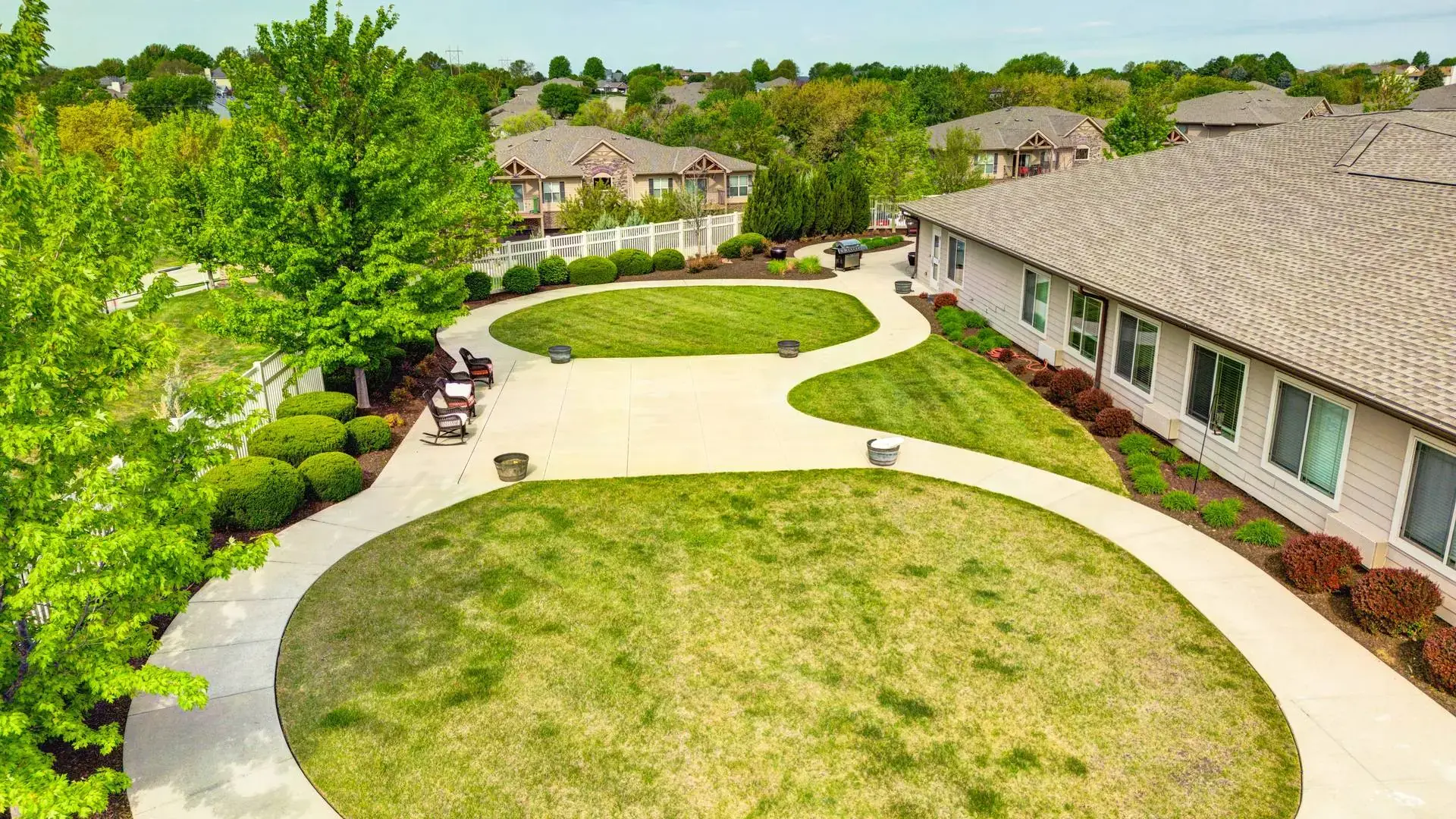 An aerial perspective showcasing the Cedar Creek of Prairie Meadows community, highlighting the inviting courtyards